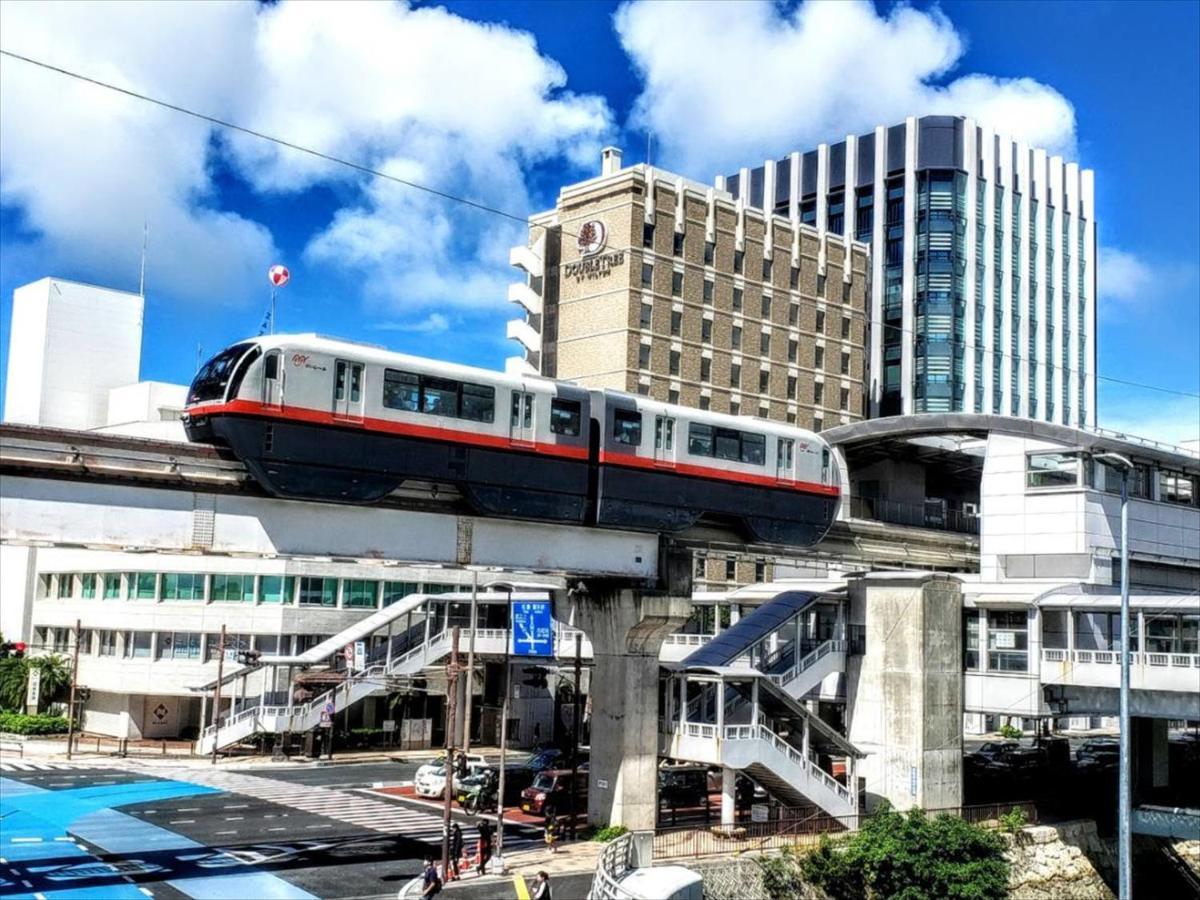 かりゆしコンドミニアムリゾート那覇スカイリビングホテル旭橋駅前 Naha Exterior foto